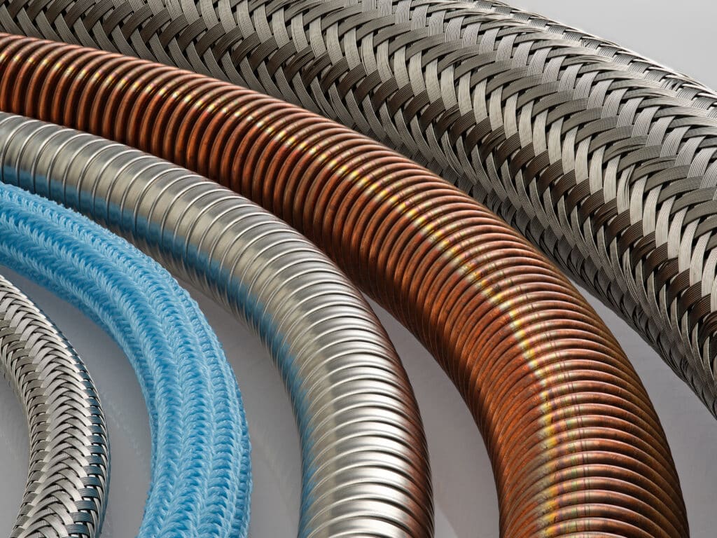 Close up of Penflex bulk hose and braid, including stainless steel and bronze hoses