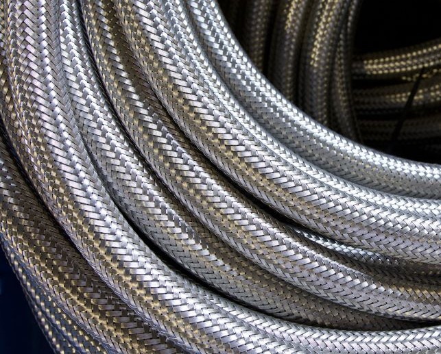 High coverage braid, seen here on Penflex P3 hose, doesn't necessarily mean higher metal hose pressure ratings. 