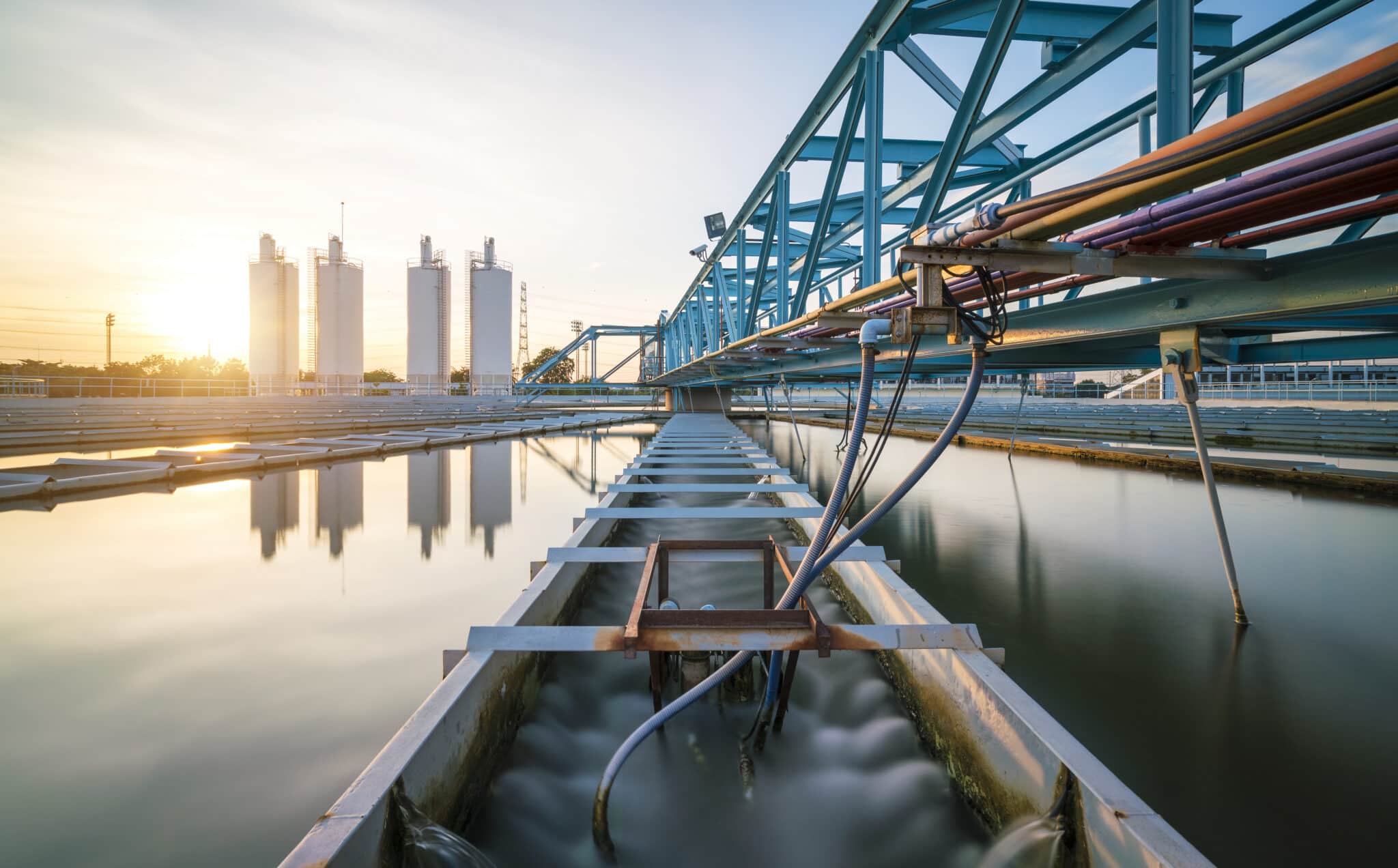 A clarifier basin in a water treatment plant, where suspended solids are settled out and chemicals are introduced and mixed.